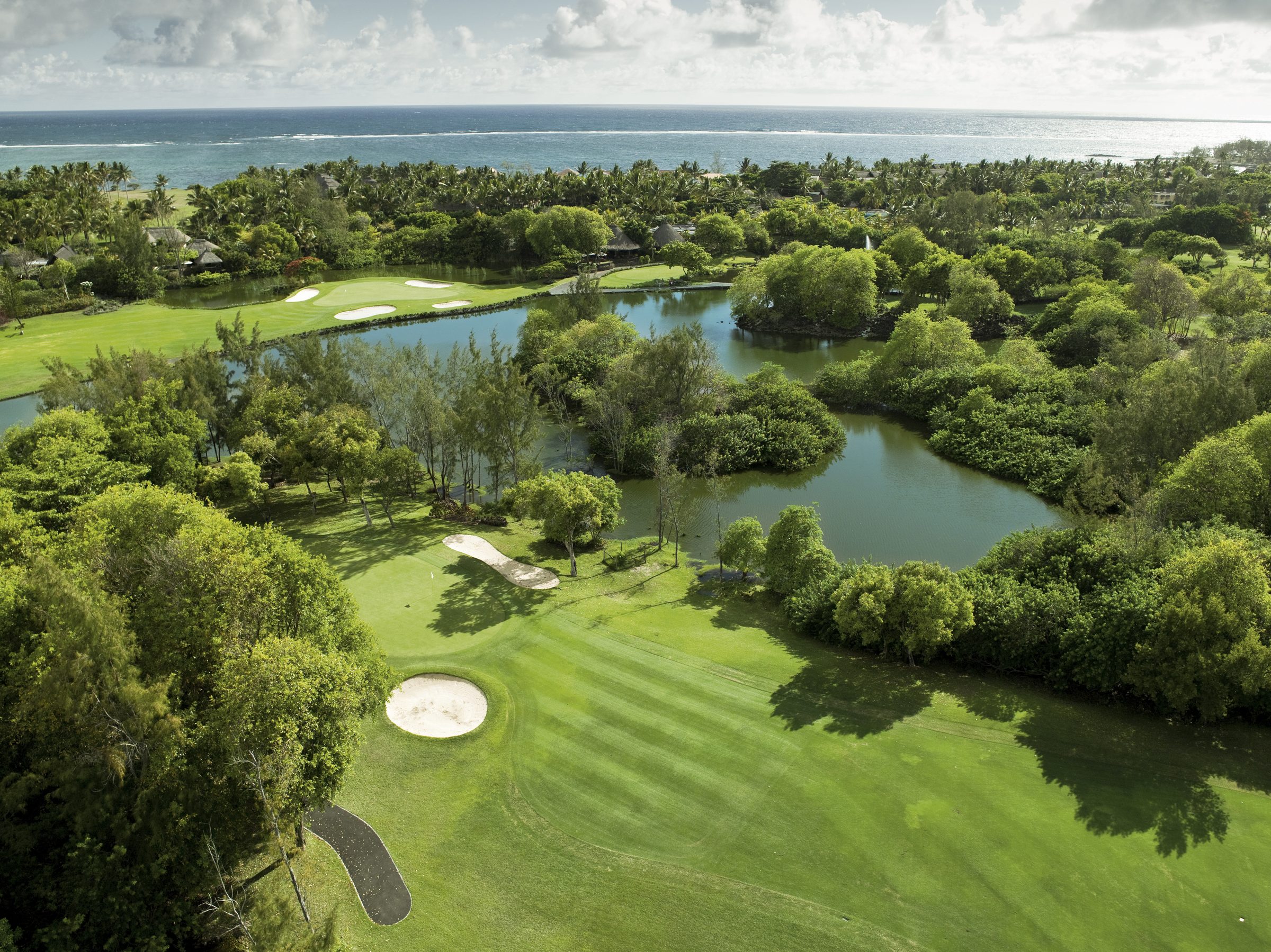 Aerial view of The Legend course at Constance Belle Mare Plage, with the lagoon beyond